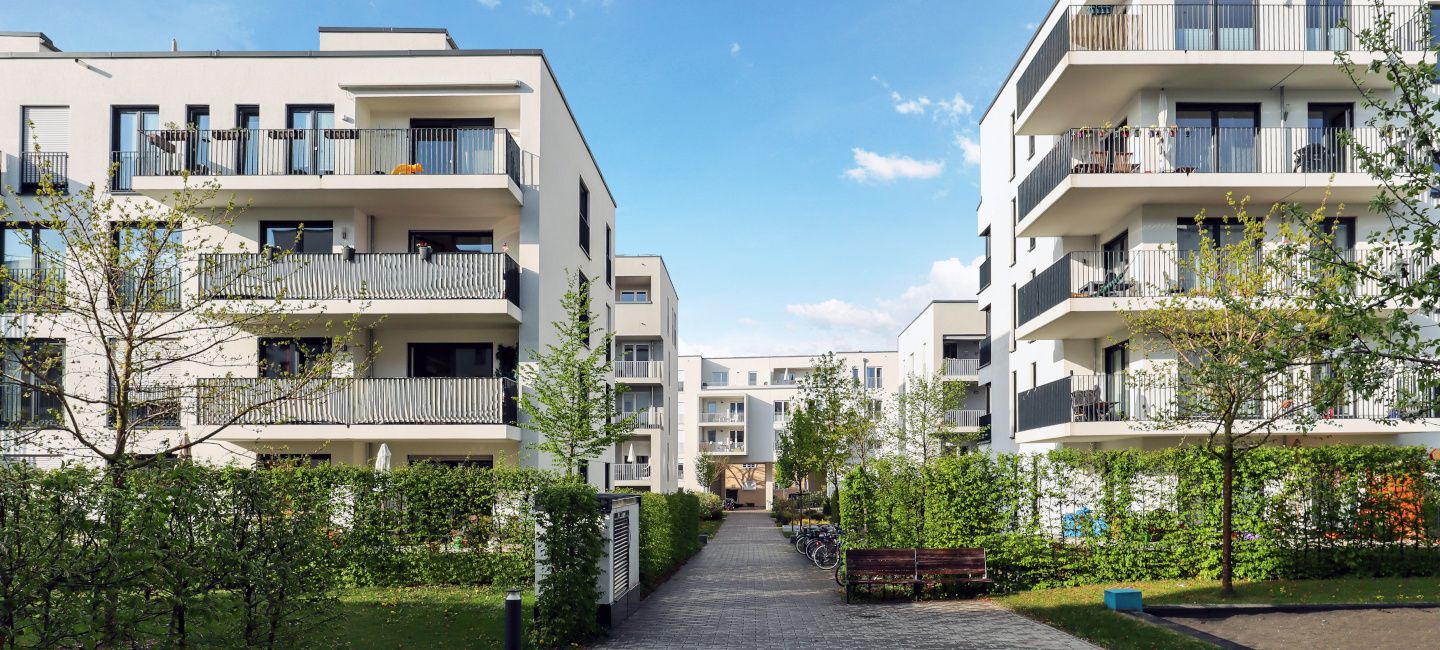 A residential complex with green spaces